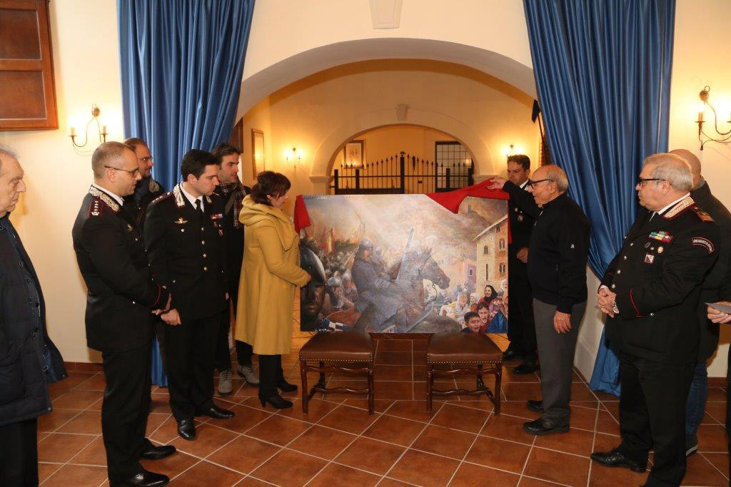Associazione dona dipinto a carabinieri Cosenza 