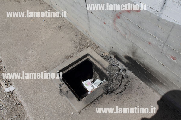 Tombini-aperti-via-Newton.jpg