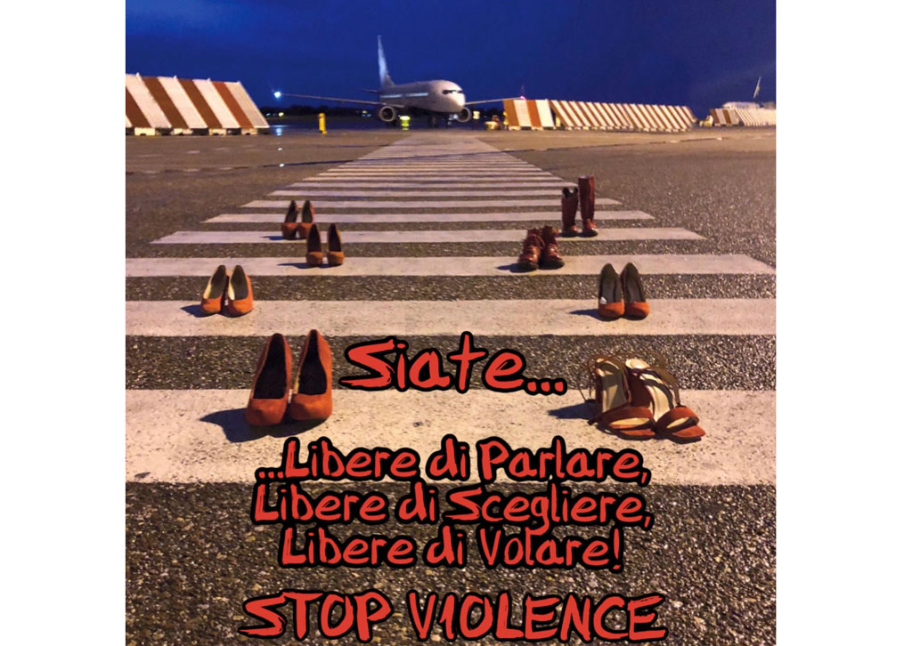 Lamezia, scarpe rosse sulle piste dell'aeroporto: il messaggio dei lavoratori Sacal contro la violenza sulle donne
